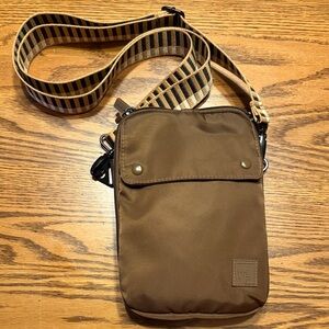 Elegant Brown crossbody Bag with Patterned Strap